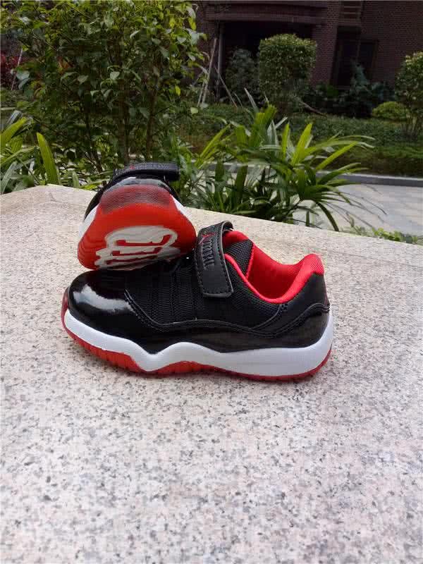 Air Jordan 11 Kids Black And Red 9