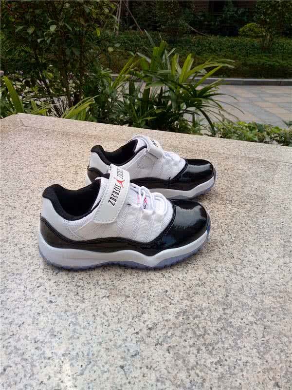 Air Jordan 11 Kids Black And White 7