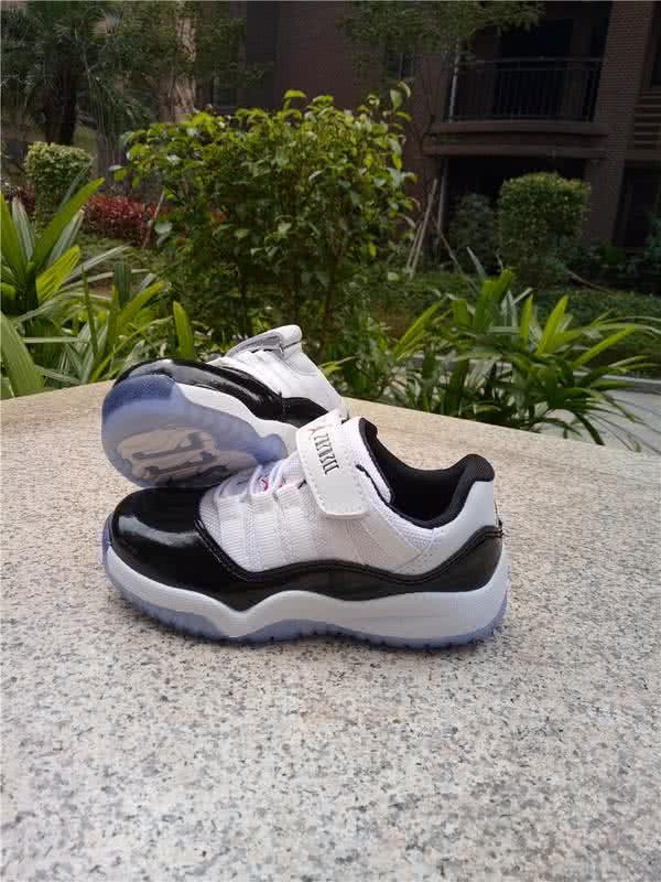 Air Jordan 11 Kids Black And White 9