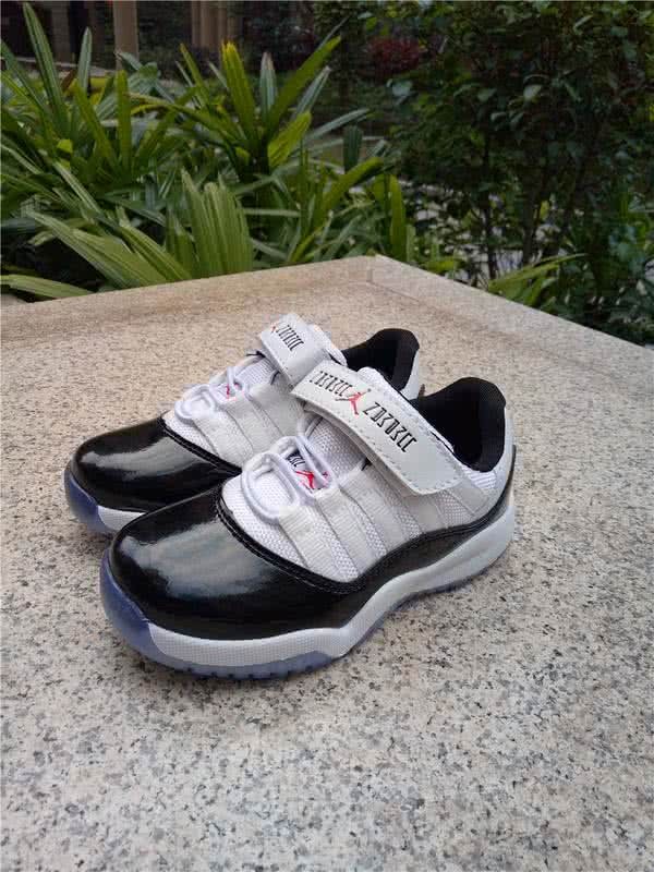 Air Jordan 11 Kids Black And White 10
