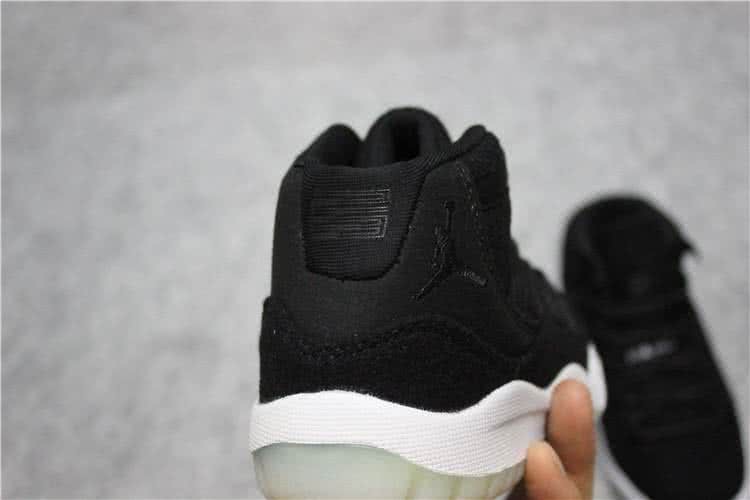 Air Jordan 11 Kids Black Upper And White Sole 7